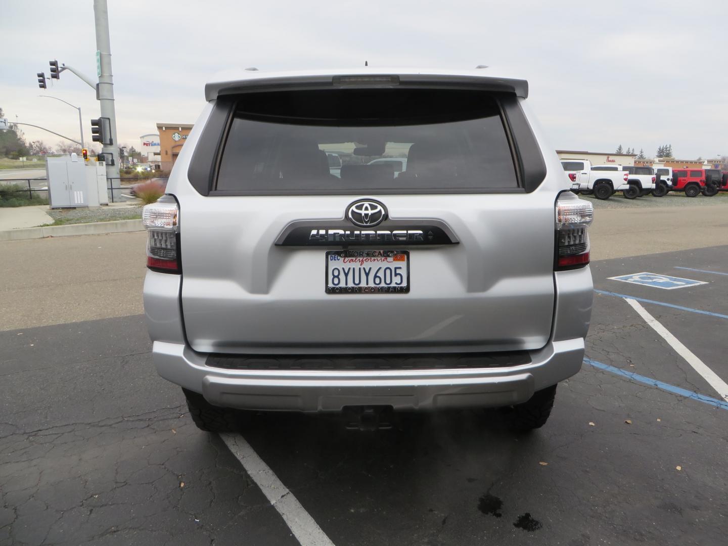 2022 SILVER /BLACK Toyota 4Runner TRD Off-road Premium (JTERU5JR0N6) with an V6, 4.0 Liter engine, Automatic, 5-Spd w/Sequential Shift transmission, located at 2630 Grass Valley Highway, Auburn, CA, 95603, (530) 508-5100, 38.937893, -121.095482 - Bilstein 5100 series front struts and rear shocks, 17" Modco wheels, and 285 Nitto Ridge Grappler tires. - Photo#5